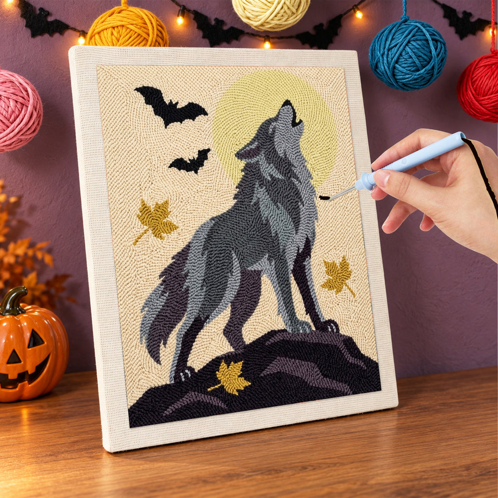 Punching the Howling Gray Wolf design with the punch needle