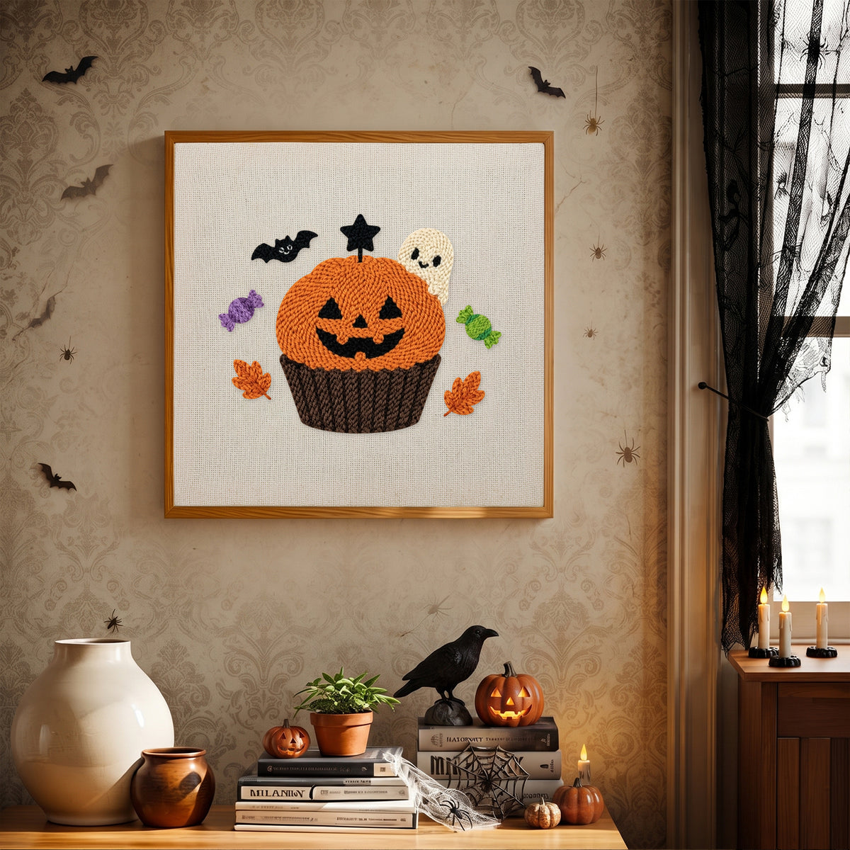Finished Jack-o'-Lantern Cupcake punch needle canvas on a wall