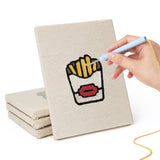 Hand punching one of the Jelly Bean Pops mini canvases