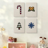The four Jingle Bells Snowflake mini canvases on a wall above a shelf