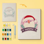 Jolly Santa Badge canvas before and after punching, with the threads and tools