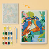 Kingfisher Pair canvas before and after punching, with the threads and tools