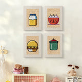 The four Kitchen Favorites mini canvases on a wall above a shelf