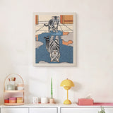 Finished Kitten and Tiger punch needle canvas on a wall