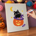 Punching the Kitten on a Pumpkin Hat design with the punch needle