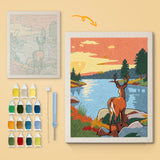 Lakeside Deer canvas before and after punching, with the threads and tools