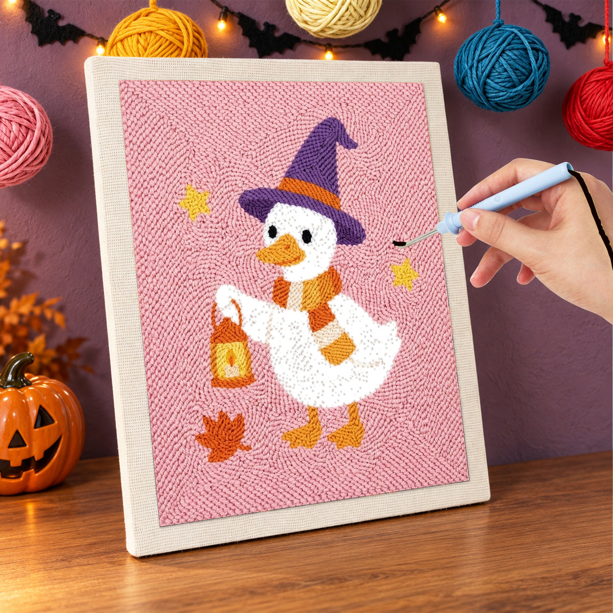 Punching the Lantern Goose design with the punch needle