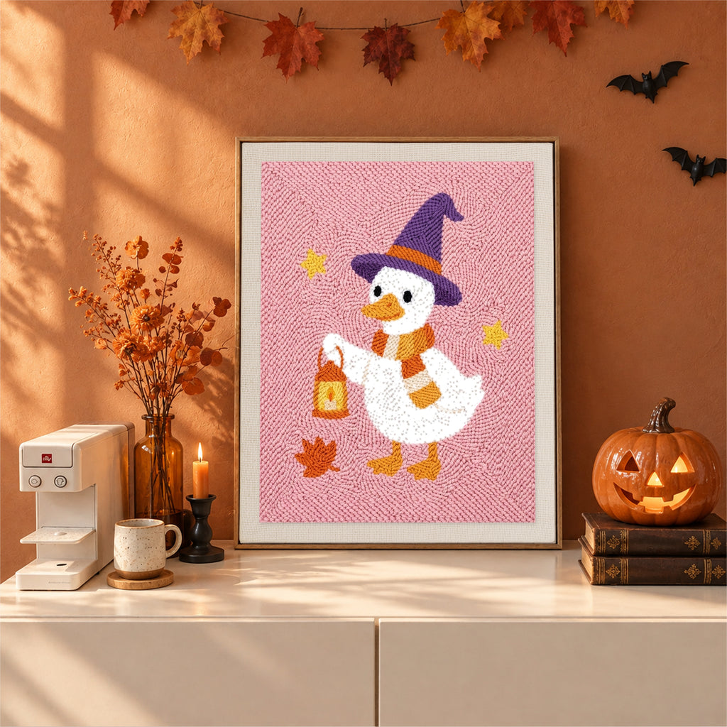 Finished Lantern Goose punch needle canvas on a wall