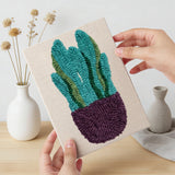 Hand holding a finished Leafy Houseplants mini canvas
