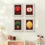 The four Lemon and Broccoli mini canvases on a wall above a shelf