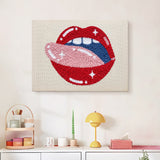 Finished Licking Red Lips punch needle canvas on a wall