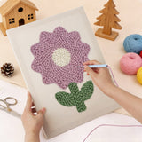 Punching the Lilac Bloom design with the punch needle