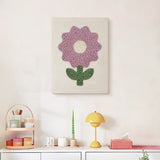 Finished Lilac Bloom punch needle canvas on a wall