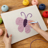 Punching the Lilac Butterfly design with the punch needle