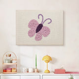 Finished Lilac Butterfly punch needle canvas on a wall