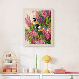 Finished Lilac Chickadees punch needle canvas on a wall