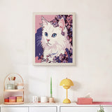 Finished Lilac White Cat punch needle canvas on a wall