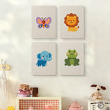 The four Lion and Friends mini canvases on a wall above a shelf