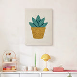 Finished Little Agave punch needle canvas on a wall