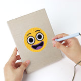Punching a Little Devils mini canvas with the punch needle
