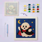 Little Vampire Ghost canvas before and after punching, with the threads and tools