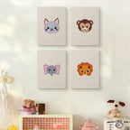 The four Little Zoo Faces mini canvases on a wall above a shelf