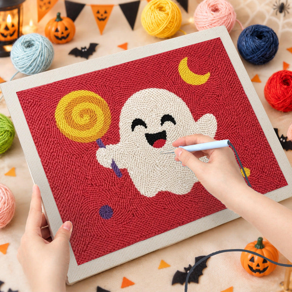 Punching the Lollipop Ghost on Red design with the punch needle