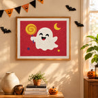 Finished Lollipop Ghost on Red punch needle canvas on a wall