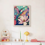 Finished Lotus Hummingbird punch needle canvas on a wall