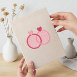 Hand holding a finished Love Letter Pink mini canvas