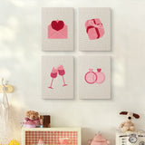 The four Love Letter Pink mini canvases on a wall above a shelf