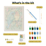 What is in the Lovebird Pair kit: printed canvas, punch needle, threader, threads, color guide and hangers