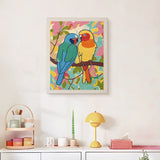 Finished Lovebird Pair punch needle canvas on a wall