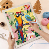 Punching the Macaw Pair design with the punch needle