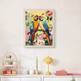 Finished Macaw Pair punch needle canvas on a wall