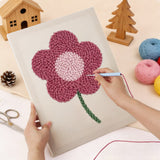 Punching the Magenta Bloom design with the punch needle