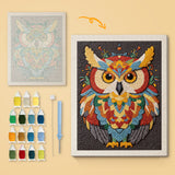 Mandala Owl canvas before and after punching, with the threads and tools