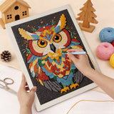 Punching the Mandala Owl design with the punch needle