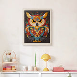 Finished Mandala Owl punch needle canvas on a wall