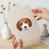 Hand holding a finished Mastiff and Beagle mini canvas