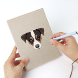Punching a Mastiff and Beagle mini canvas with the punch needle