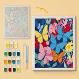 Midnight Butterflies canvas before and after punching, with the threads and tools
