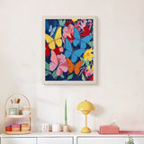 Finished Midnight Butterflies punch needle canvas on a wall