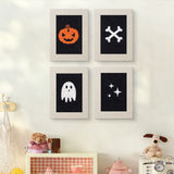 The four Midnight Ghost mini canvases on a wall above a shelf