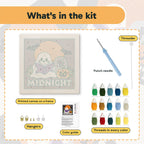 What is in the Midnight Reading Ghost kit: printed canvas, punch needle, threader, threads, color guide and hangers