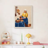 Finished Milkmaid Pouring punch needle canvas on a wall