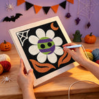 Punching the Monster Daisy design with the punch needle