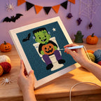 Punching the Monster on the Loo design with the punch needle