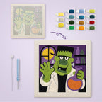 Monster Scientist canvas before and after punching, with the threads and tools