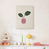 Finished Monstera Bud Vase punch needle canvas on a wall